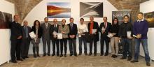 Autoridades, directivos del Grupo La Información y premiados en el concurso fotográfico.